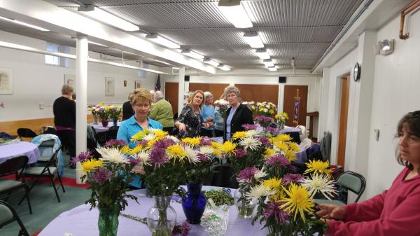 Court St Monica members gathered on 5/7/16 with guests from three other courts for their First Saturday celebration.  The day started with the Rosary and Mass.  Members enjoyed a light breakfast, then spent time arranging flowers from the court's Mothers Day fundraiser for display on the altar.  The event concluded with a May Crowning.