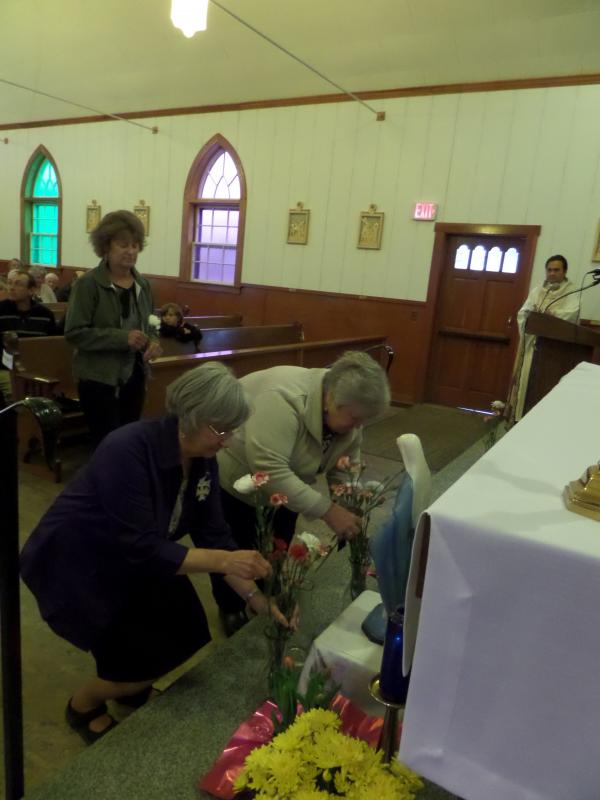 Doris Voyer and Helen Willey at the May 2017 crowning at Our Lady of Fatima Church in Craftsbury in celebration of the 100th anniversary of the apparitions at Fatima.  