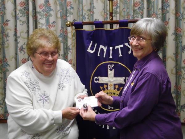 Mary Ainsworth, Vice Regent, is receiving her 50 year membership pin and certificate from Doris Voyer, Regent, at the 4/7/16 meeting.