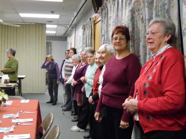 12/1/16 CDA members line up at the Advent Party.
